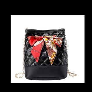 Twilly draw string crossbody purse